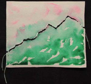 Mixed media watercolor painting of green mountain with pink sky